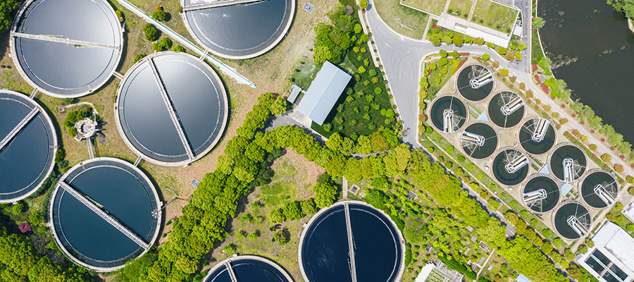 Aerial view of tanks at a large wastewater treatment plant